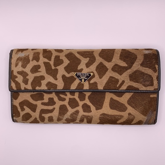 Prada Handbags - Prada 🦒 giraffe print wallet